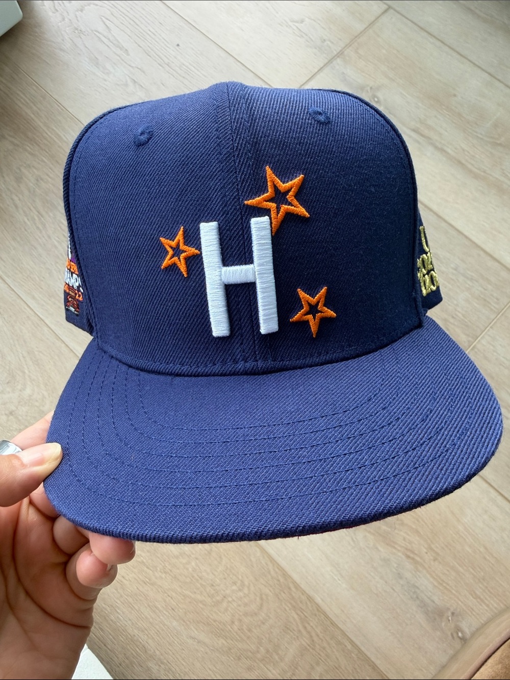Men’s Navy Snapback Hat with White 'H' & Orange Stars